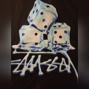 Stussy Black Tee with White and Blue Melting Dice Graphic
